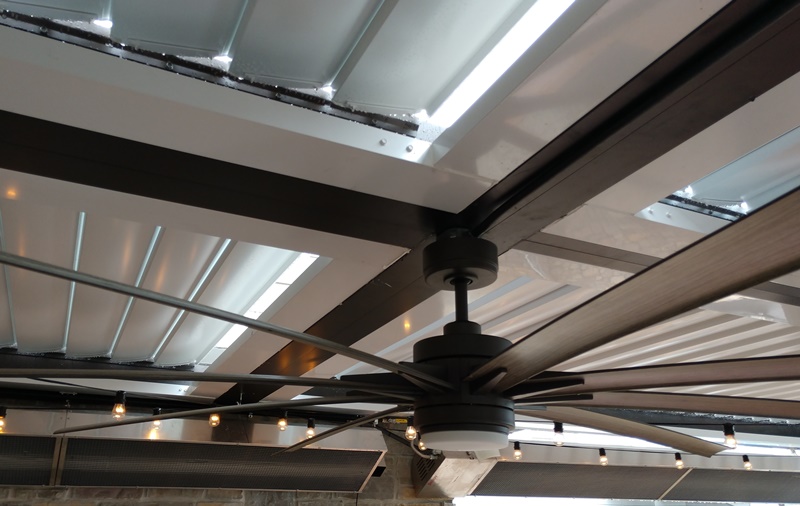 louvered roof integrated gutter system